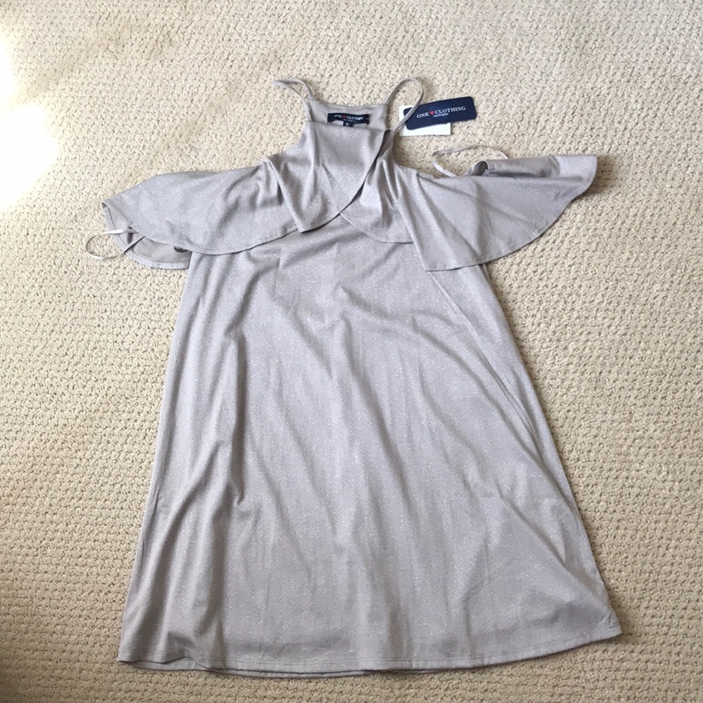 Taupe flows dress.